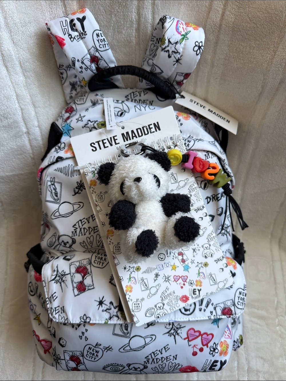 Steve Madden NYC White Graffiti Print Backpack with Notebook & Plush Panda Charm